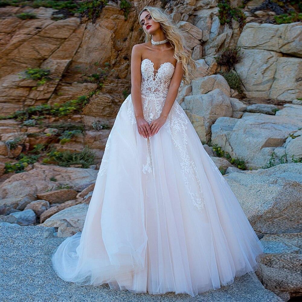 Robe de mariage en dentelle boheme