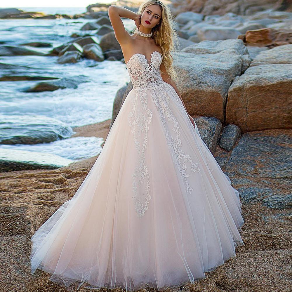 Robe de mariage en dentelle boheme