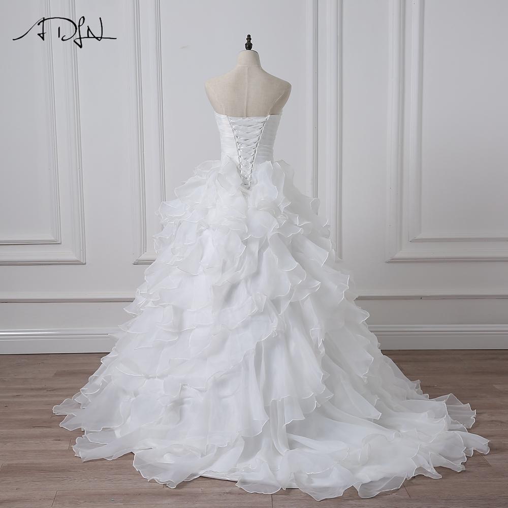 Robe de mariée bohème chic fleurs