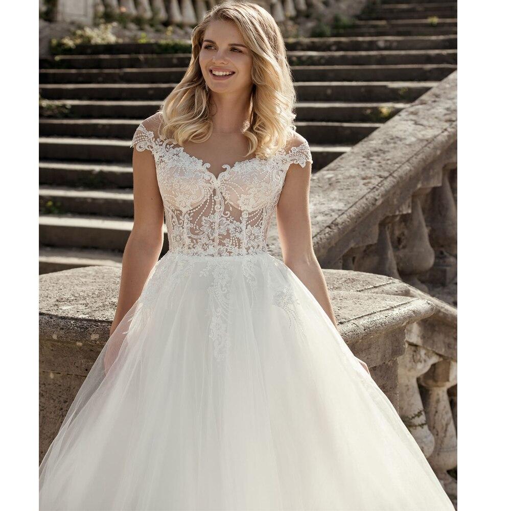 Robe de mariée boheme manche longue