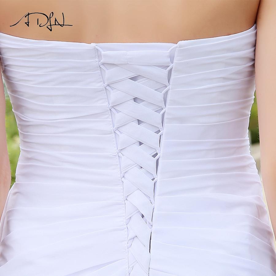 Robe de mariée en dentelle boheme chic