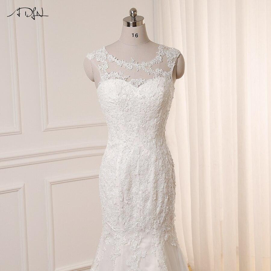 Robe de mariée simple fluide manches evasées bohéme