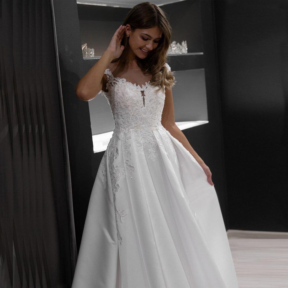 Robe dentelle blanche bohème chic mariage