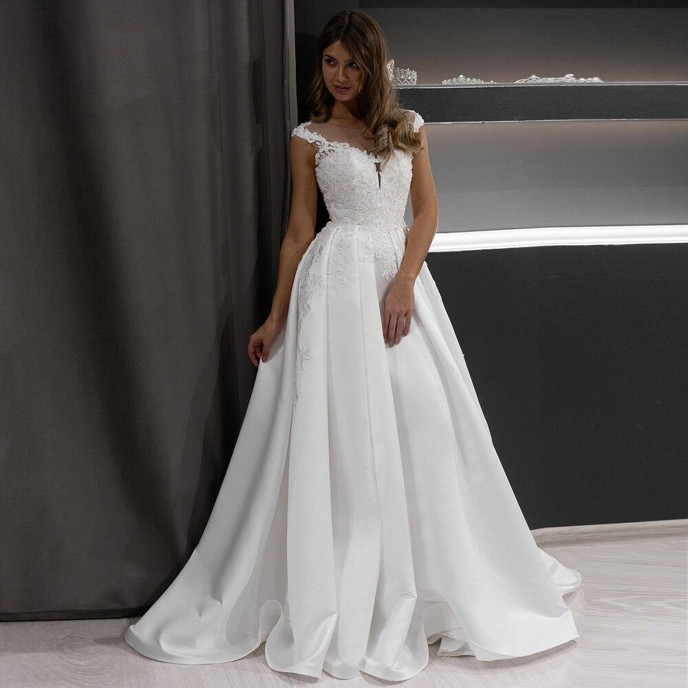 Robe dentelle blanche bohème chic mariage