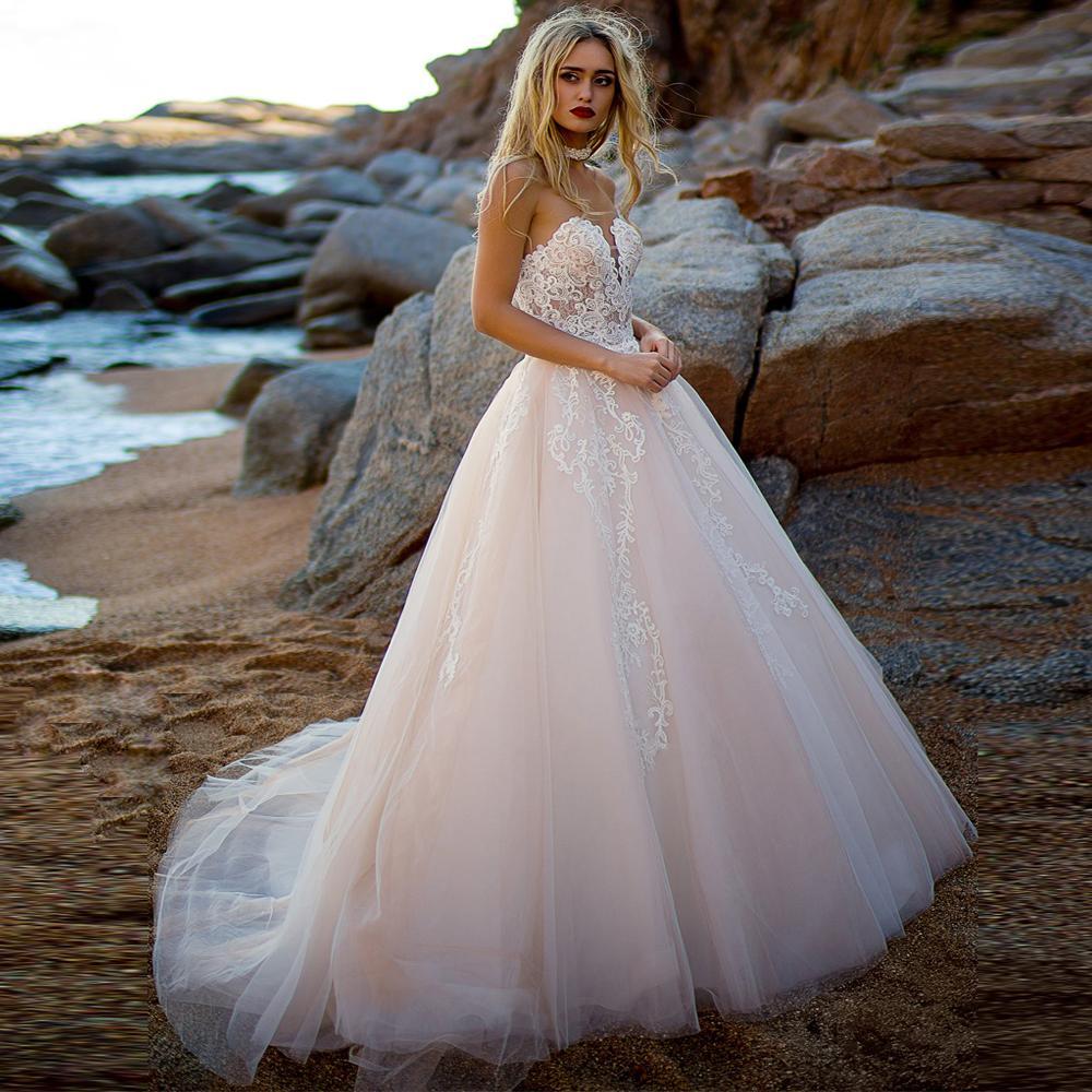 Robe de mariage en dentelle boheme