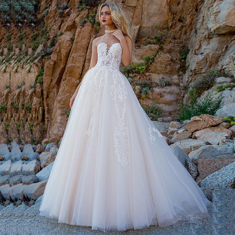 Robe de mariage en dentelle boheme