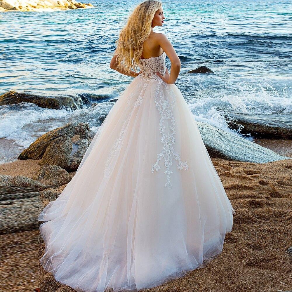 Robe de mariage en dentelle boheme