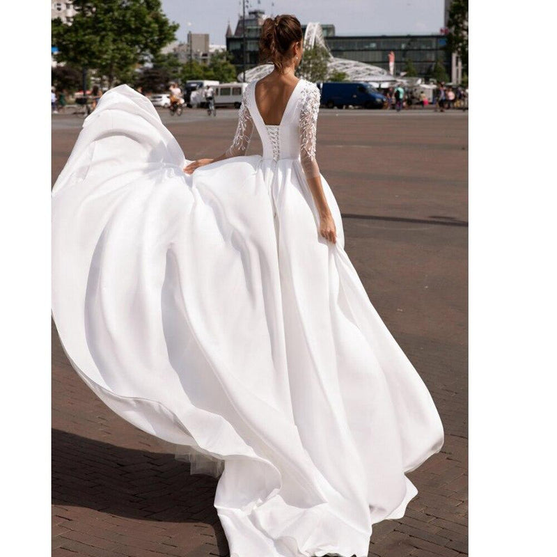 Robe de mariée bohème chic avec des manche
