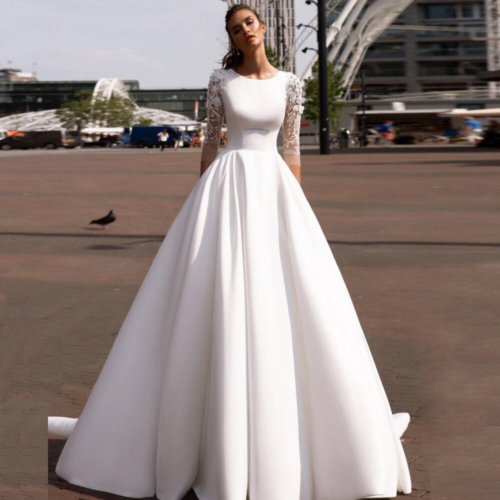 Robe de mariée bohème chic avec des manche