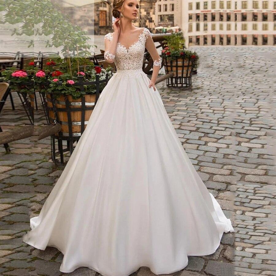 Robe de mariée bohème chic dentelle manche