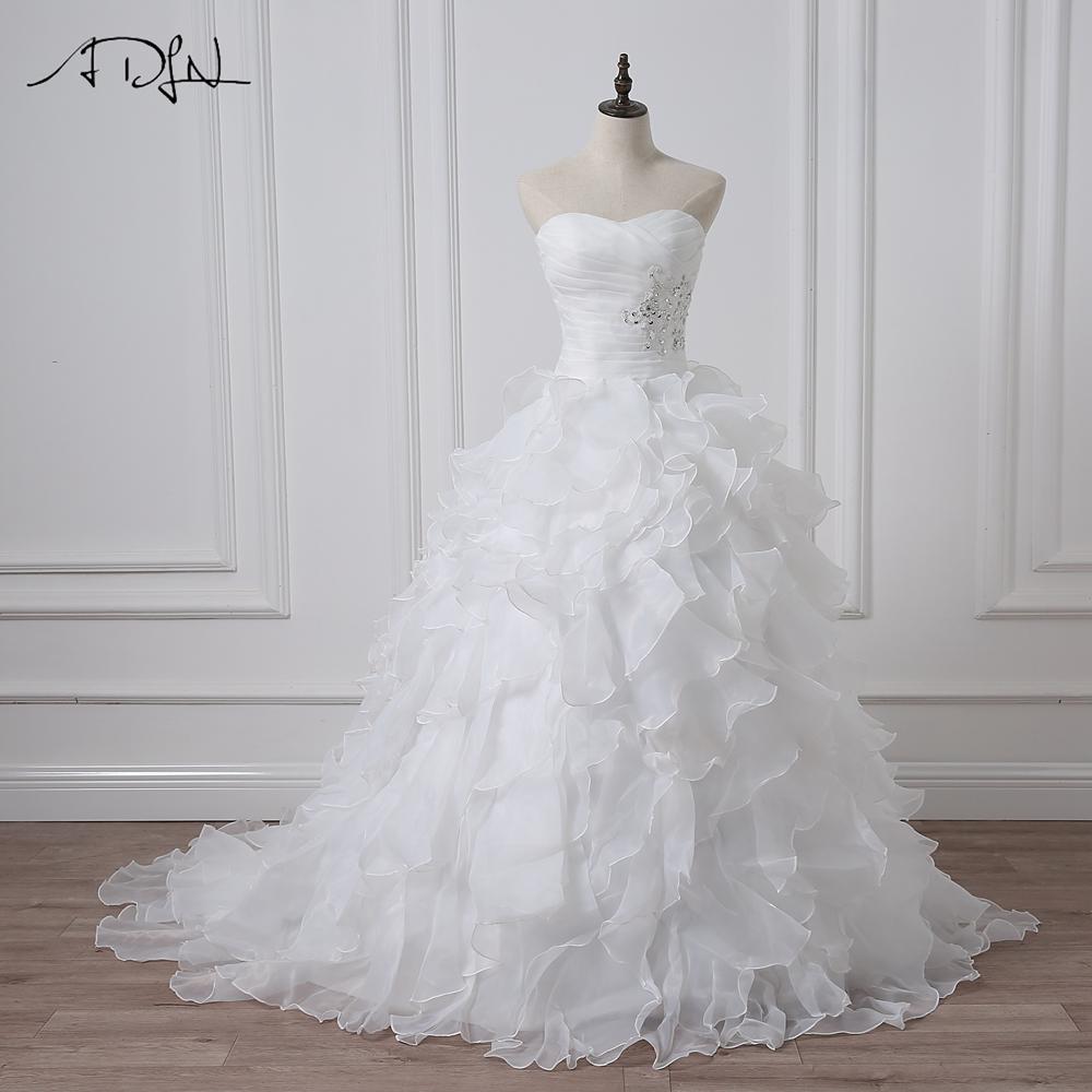 Robe de mariée bohème chic fleurs