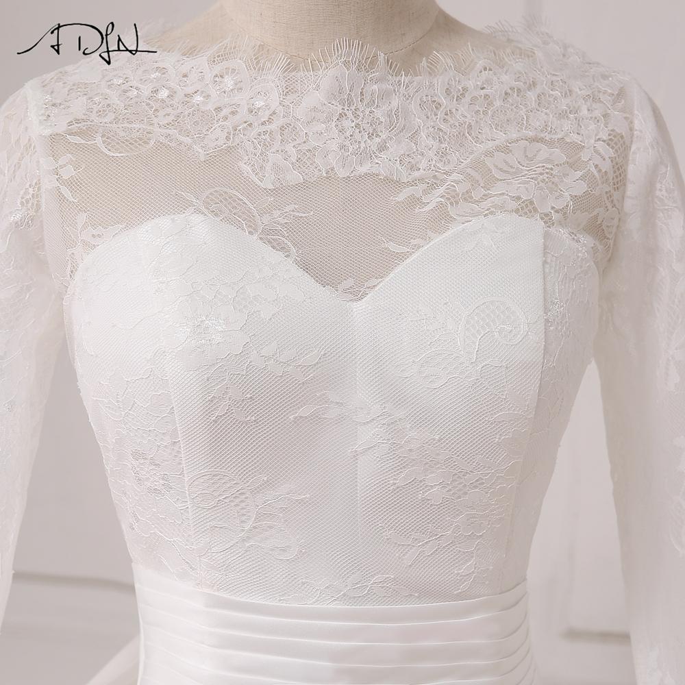Robe de mariée bohème dentelle manche longue