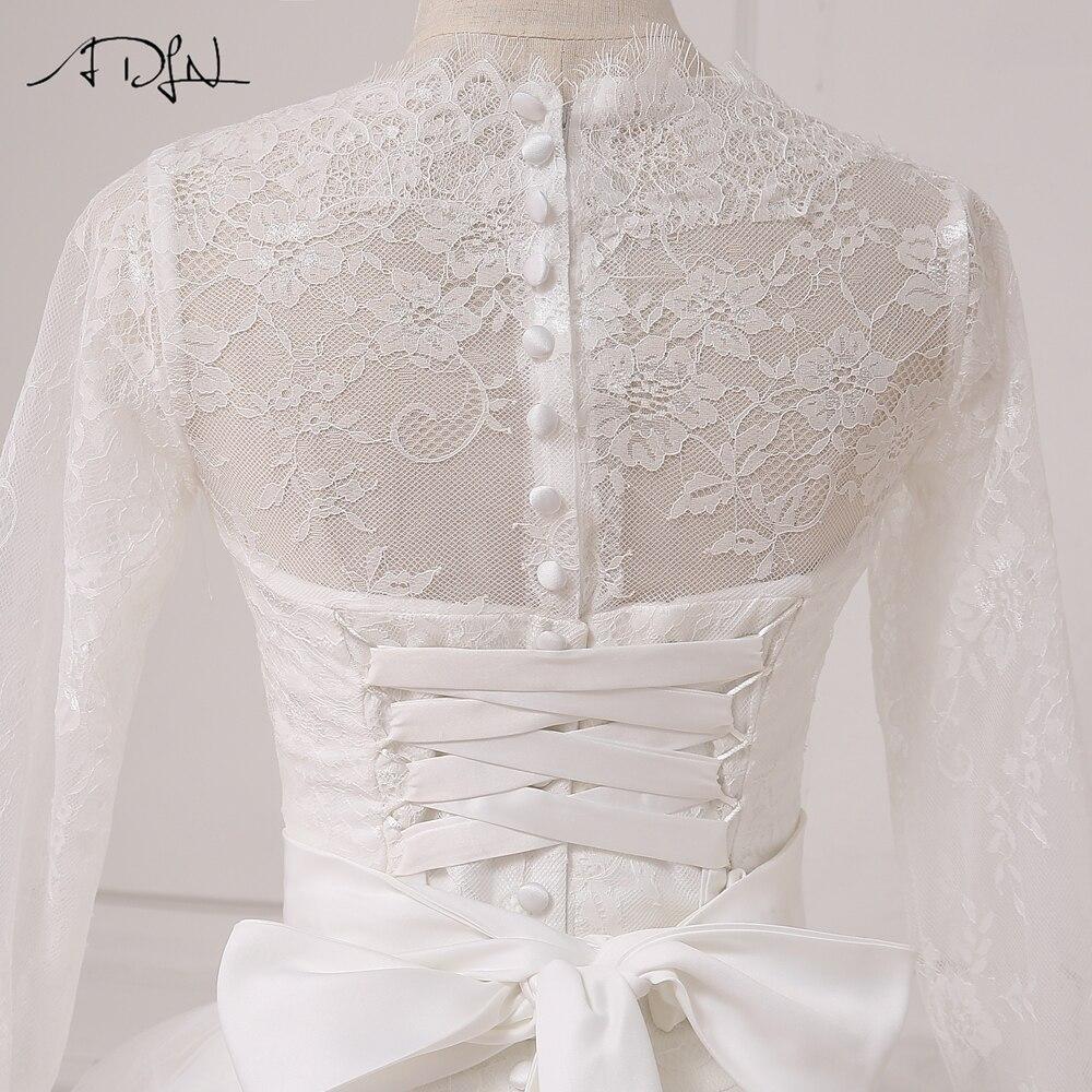 Robe de mariée bohème dentelle manche longue