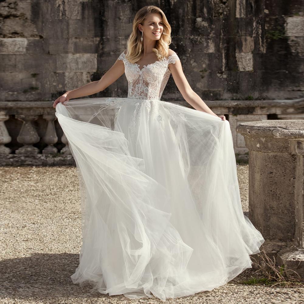 Robe de mariée boheme manche longue