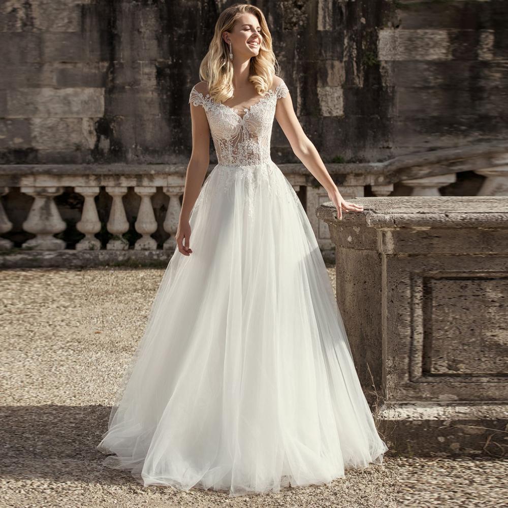 Robe de mariée boheme manche longue