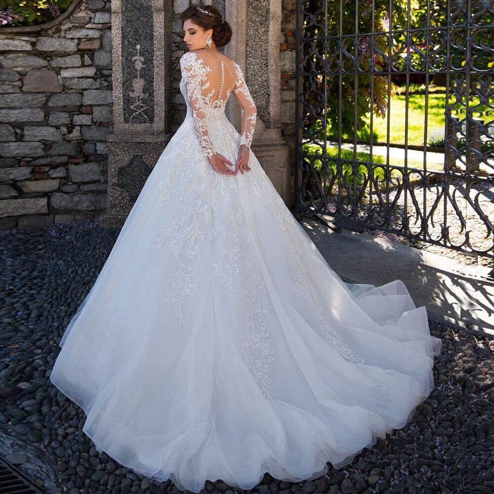 Robe de mariée chic et bohème en dentelle