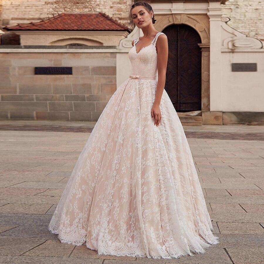 Robe de mariée fluide dentelle boheme