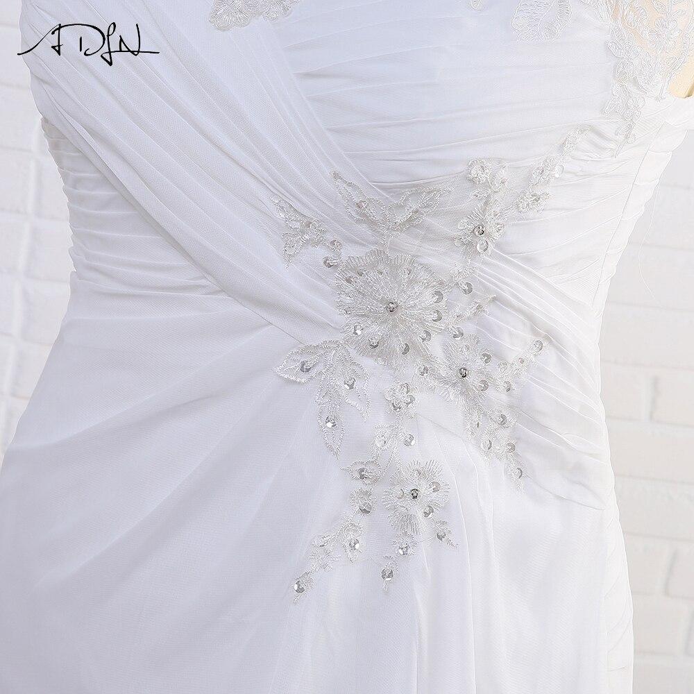 Robe de mariée hippie dentelle