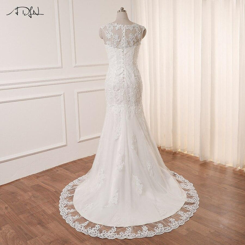 Robe de mariée simple fluide manches evasées bohéme
