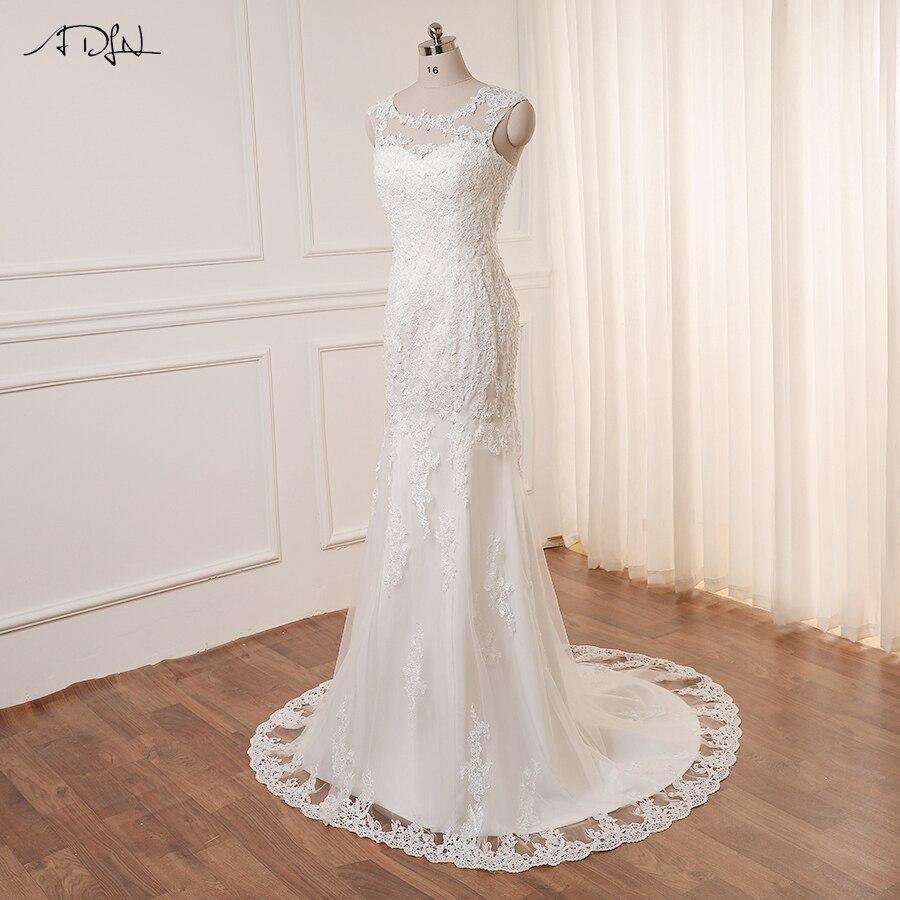 Robe de mariée simple fluide manches evasées bohéme