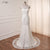 Robe de mariée simple fluide manches evasées bohéme