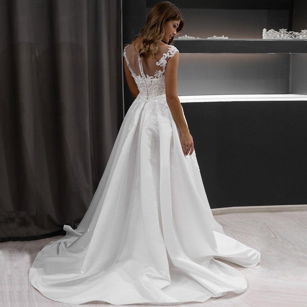 Robe dentelle blanche bohème chic mariage