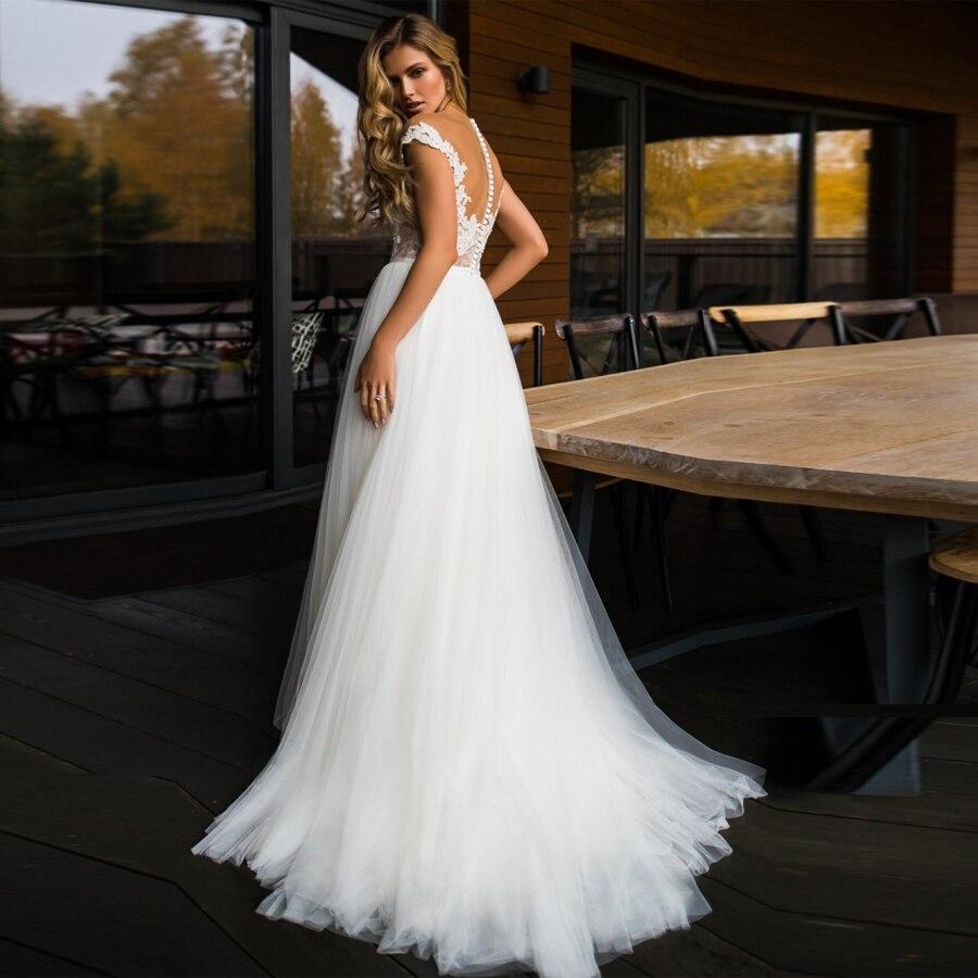 Robe longue blanche boheme mariage