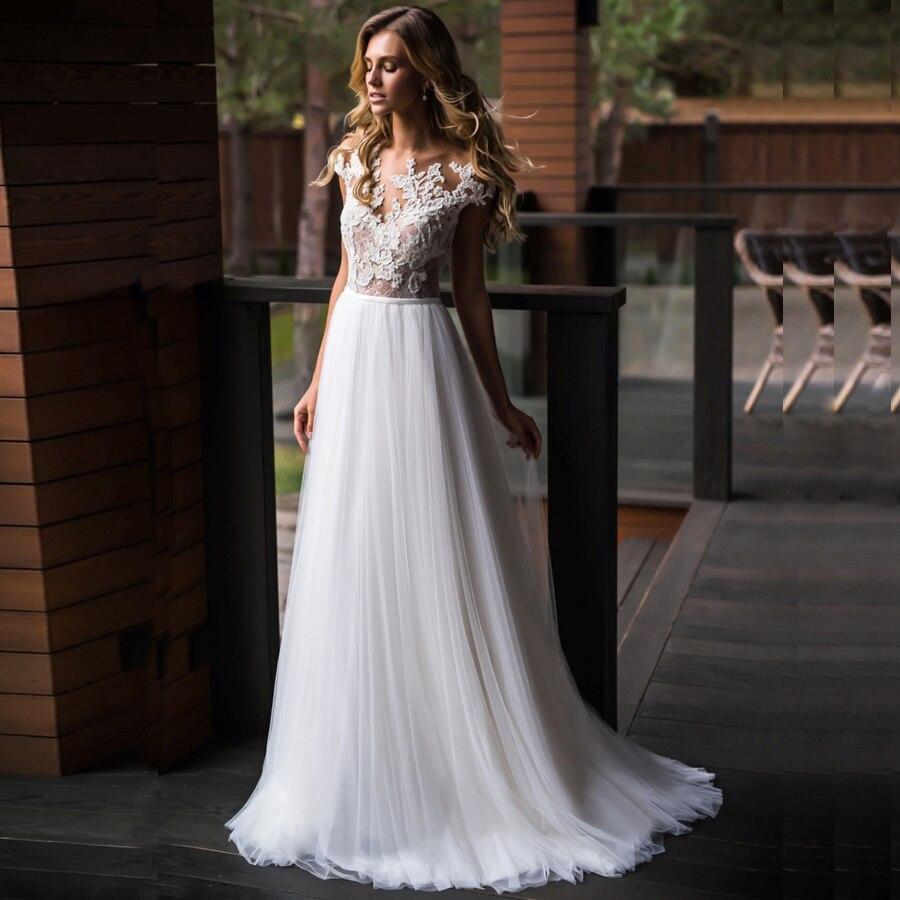 Robe longue blanche boheme mariage