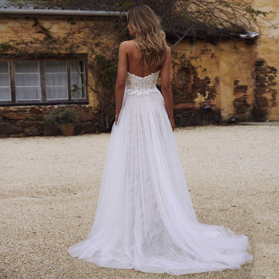 Robe longue dos mariage nu bohème