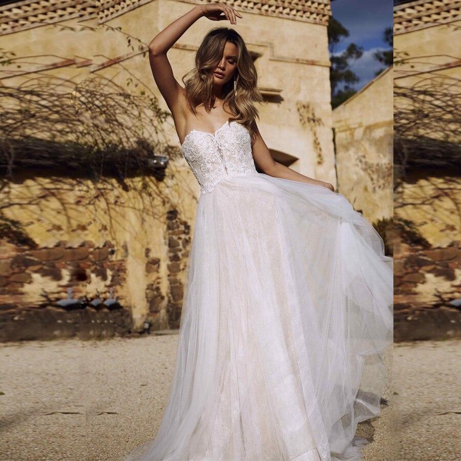 Robe longue dos mariage nu bohème