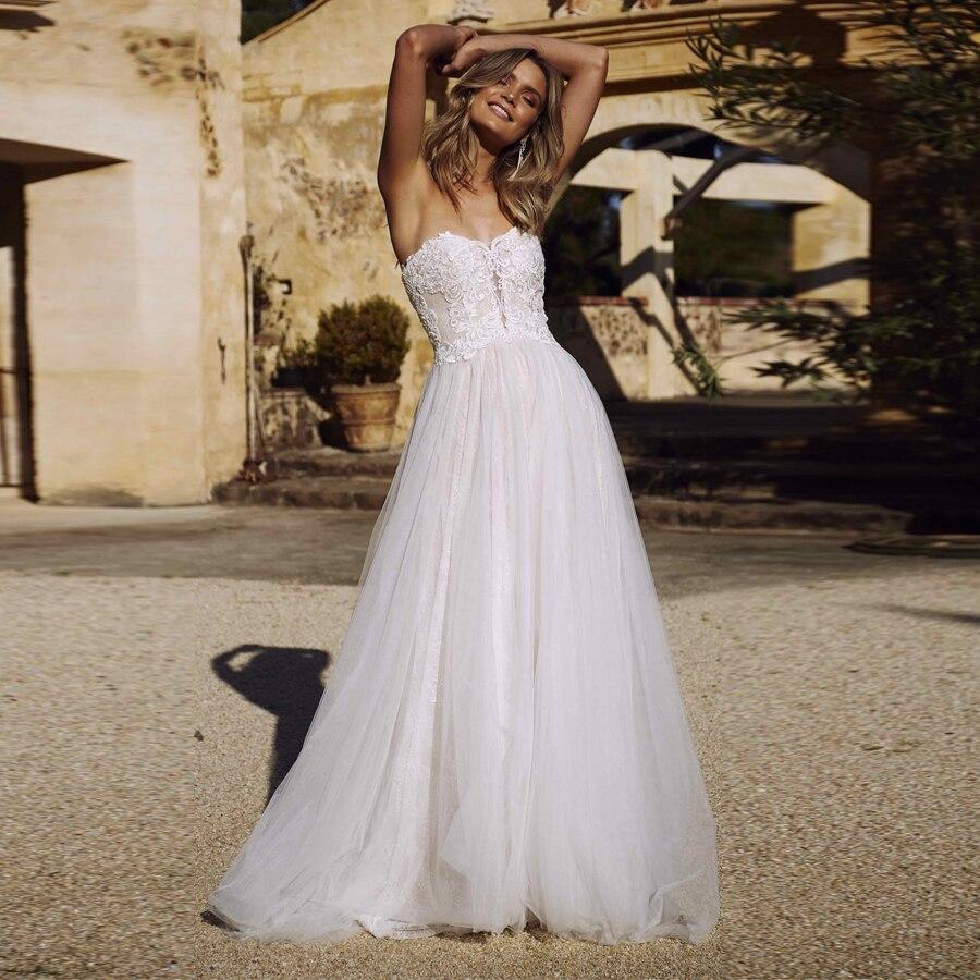 Robe longue dos mariage nu bohème