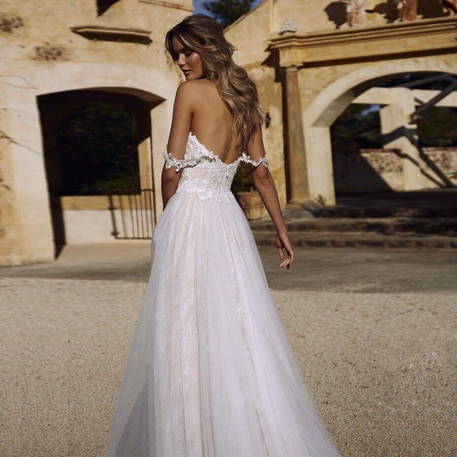 Robe longue dos mariage nu bohème