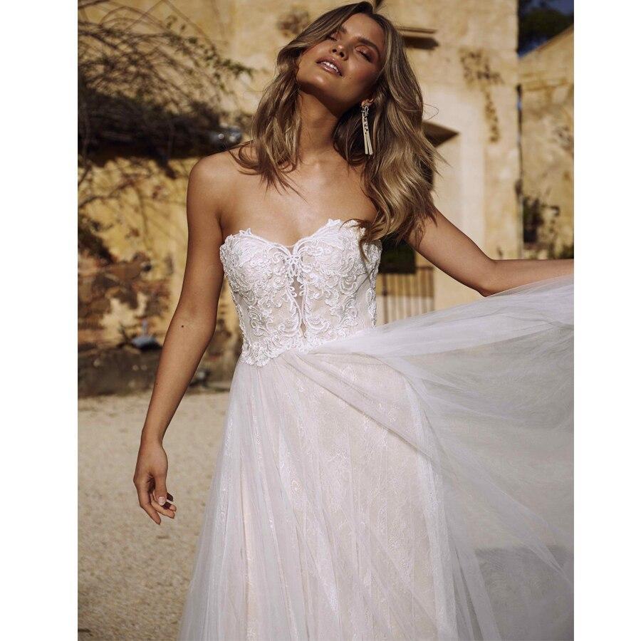 Robe longue dos mariage nu bohème